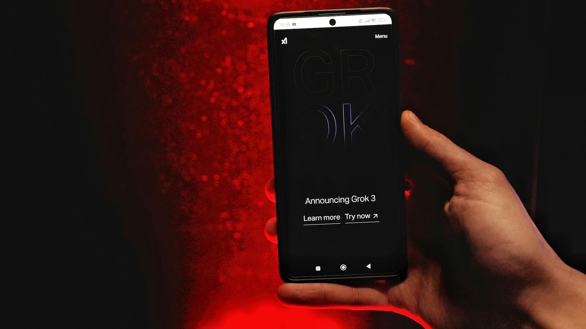 Hand holding a smartphone with AI chatbot app, emphasizing artificial intelligence and technology.