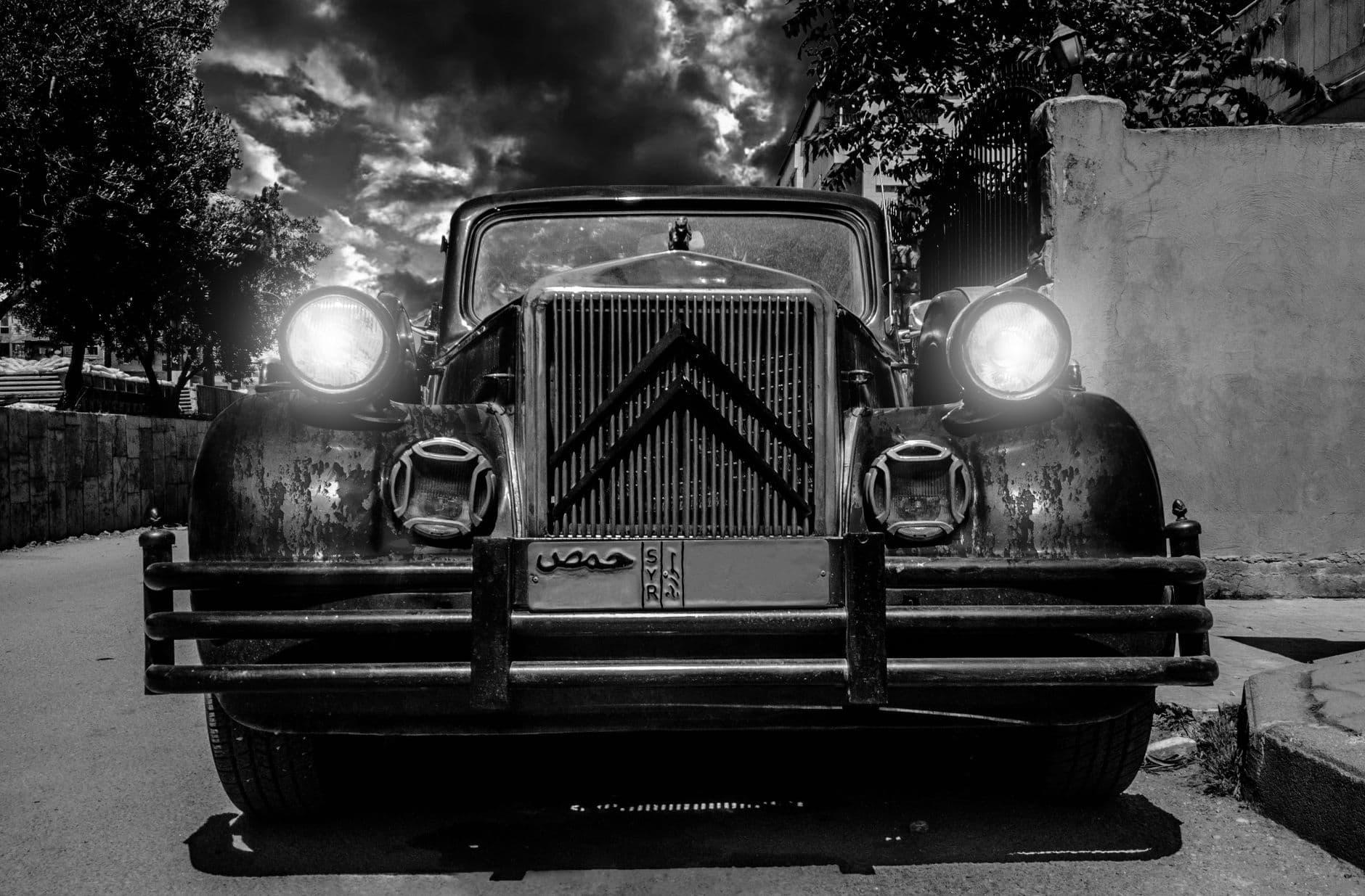 Monochrome image of a classic Citroen car showcasing vintage charm and retro design.
